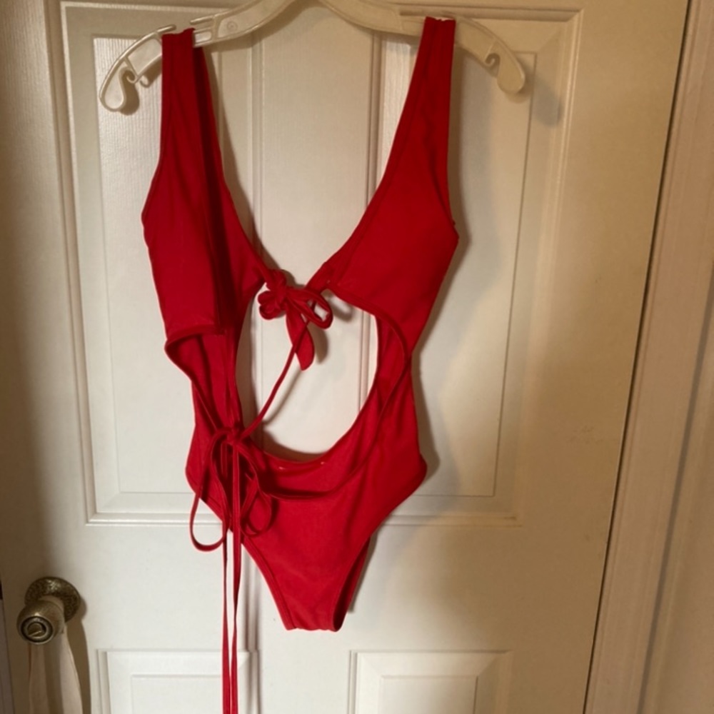 Red cutout one piece bathing suit